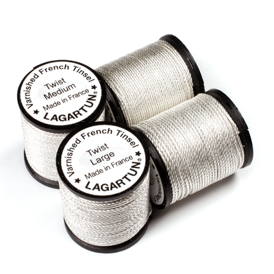 Lagartun Twist, Medium and Large sizes, in Silver. Side by side placement allows you to see the relative size difference.